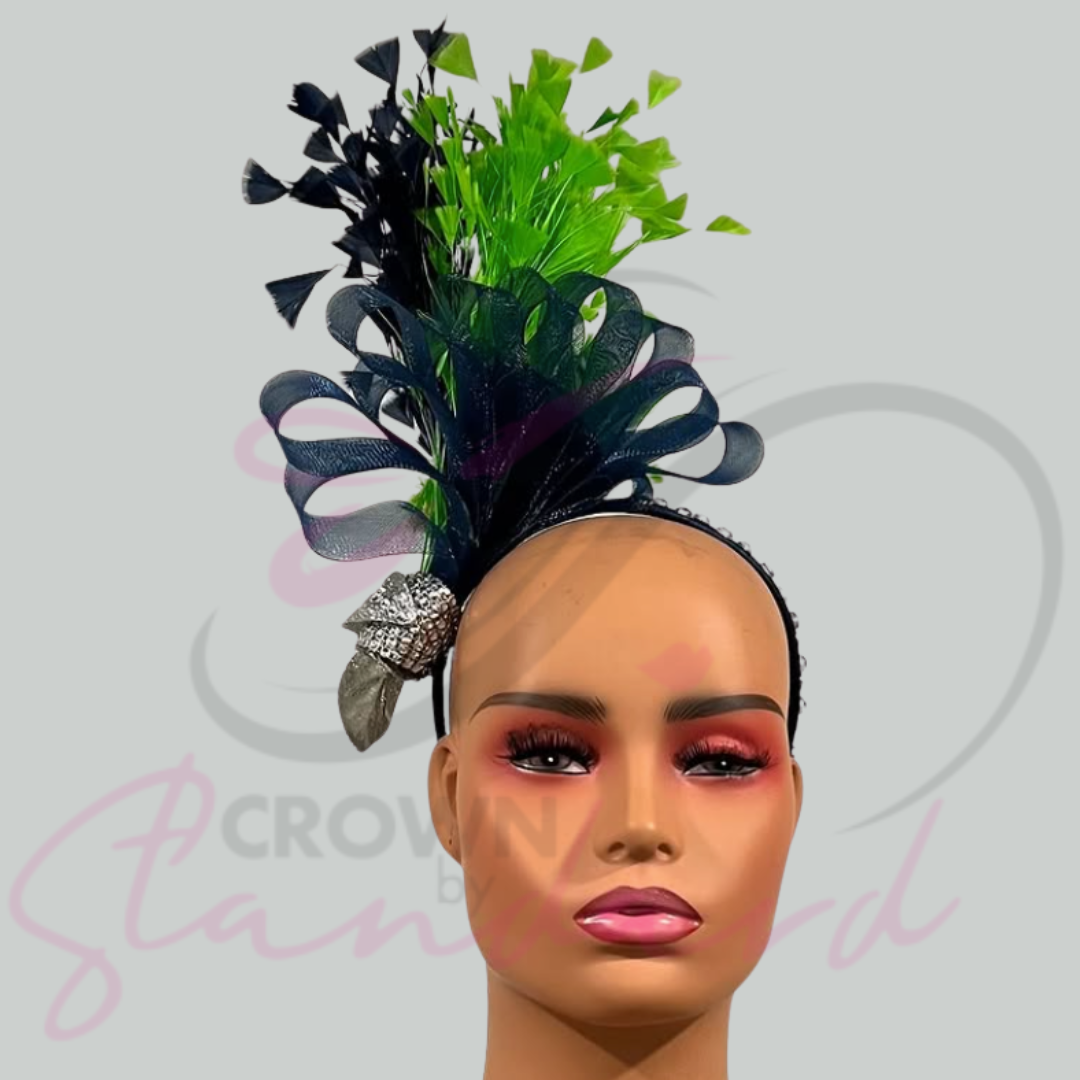 A navy blue fascinator, with lime green and navy blue feathers, crinoline, and a little bling on the headband!