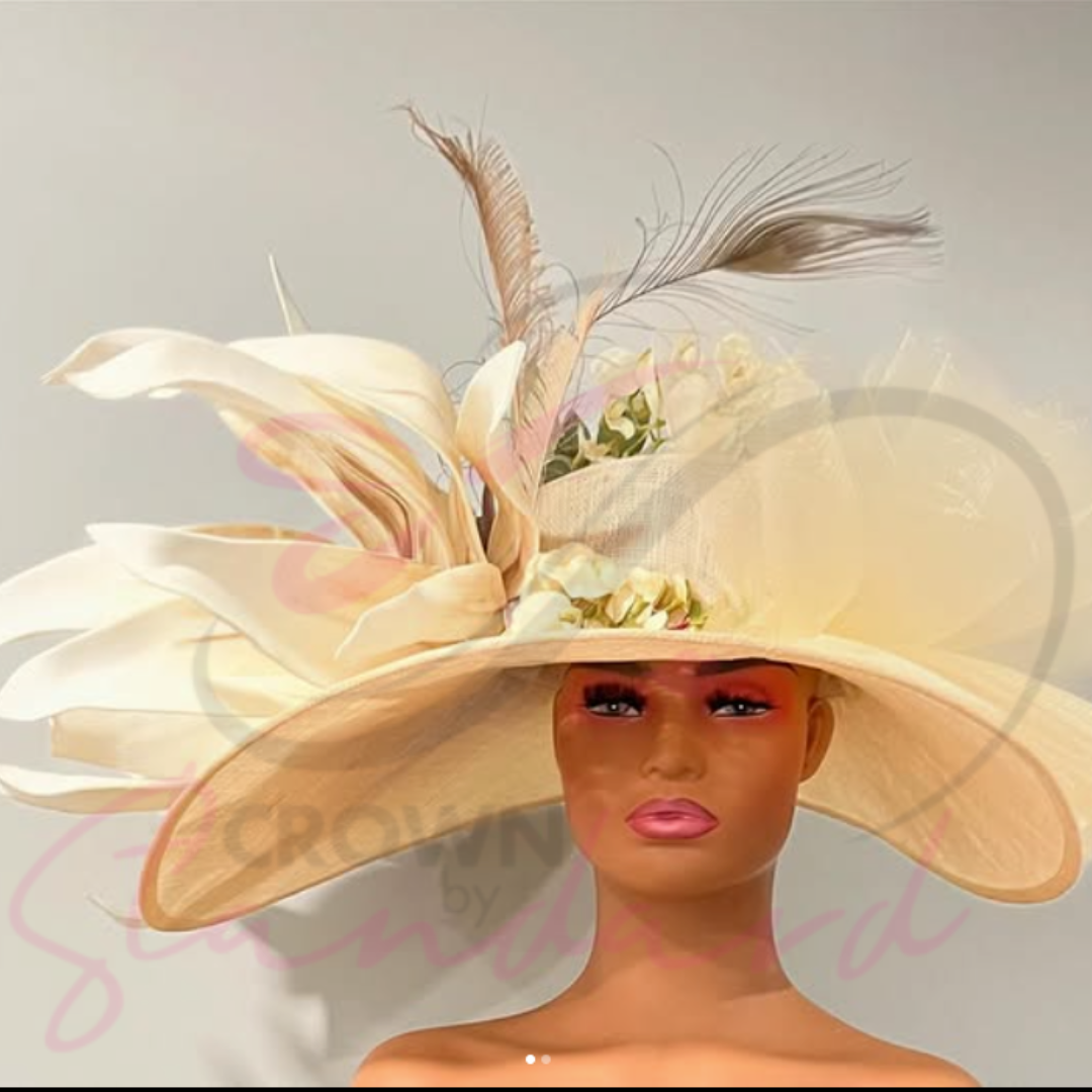 This Ivory hat with a huge flower, flowers, crinoline is so versatile and would complement any outfit!