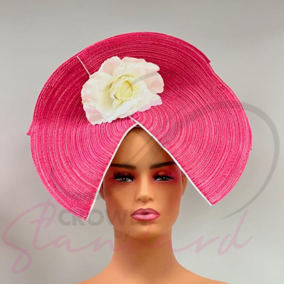 Pink fascinator with a flower in the middle!