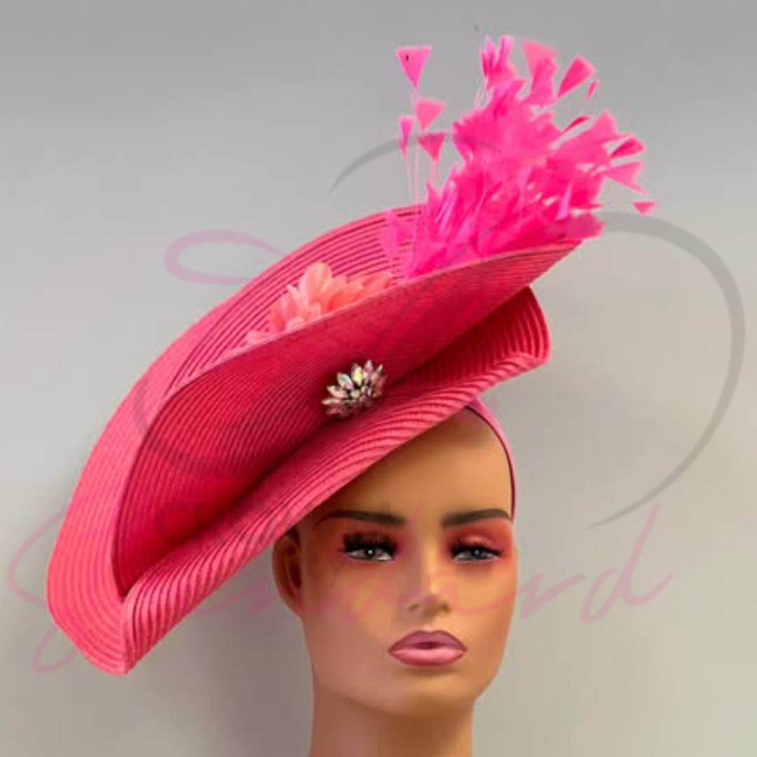 Pink fascinator with feathers and a rhinestone!