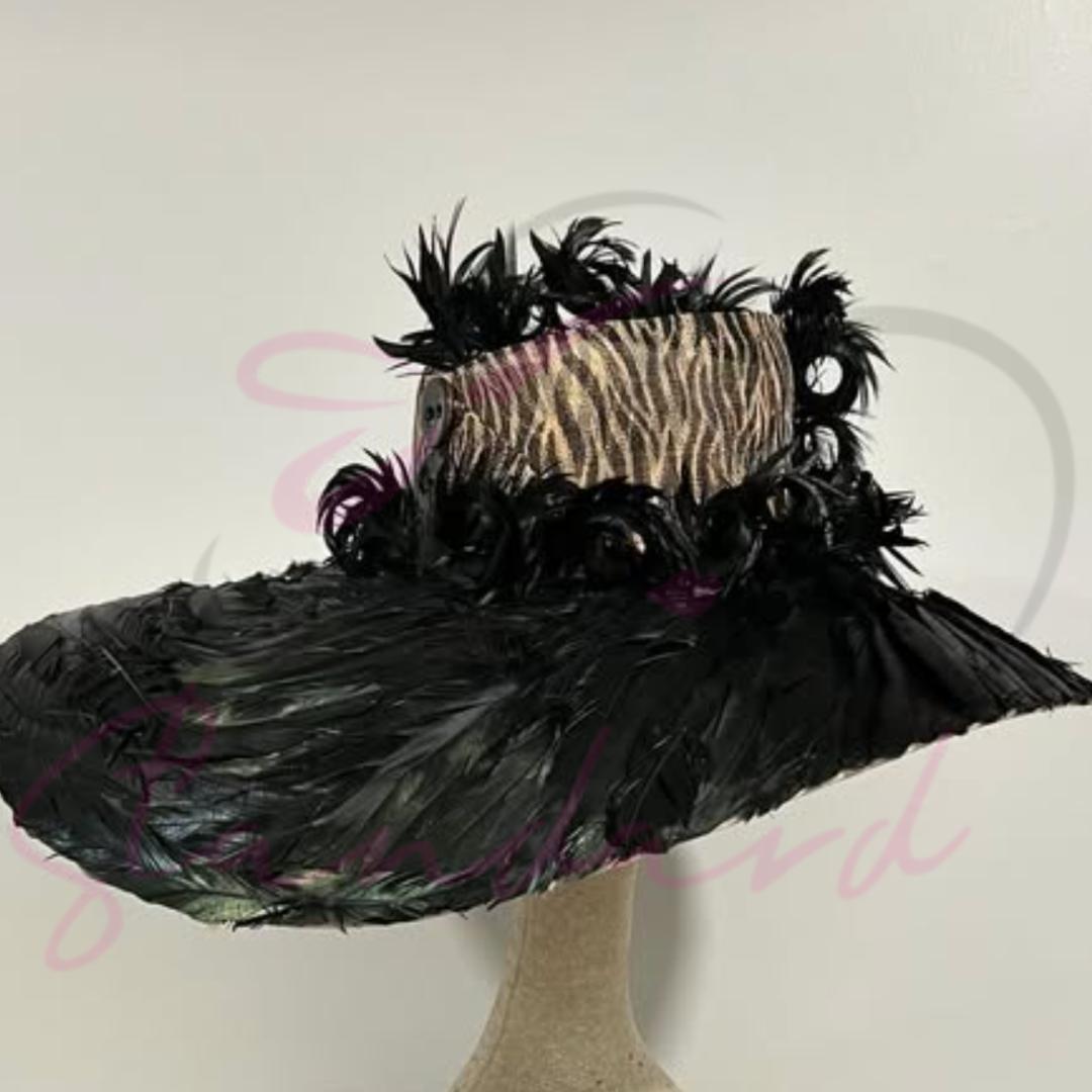 Tan hat with a leopard print crown and a black feathered brim!