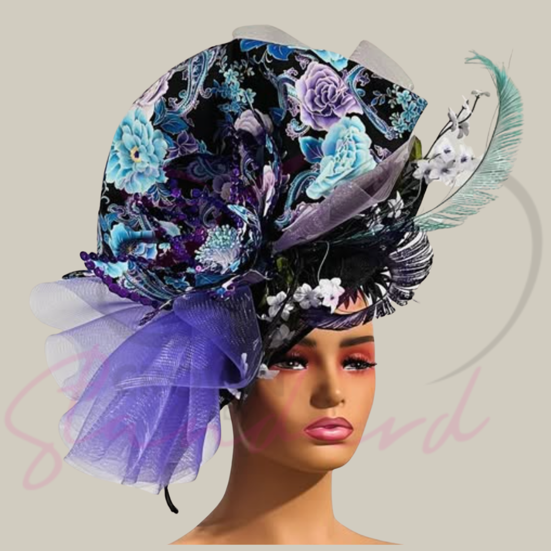 This gorgeous fascinator has a huge handmade flower, as well as a handmade gathered trim with crinoline, and feathers!