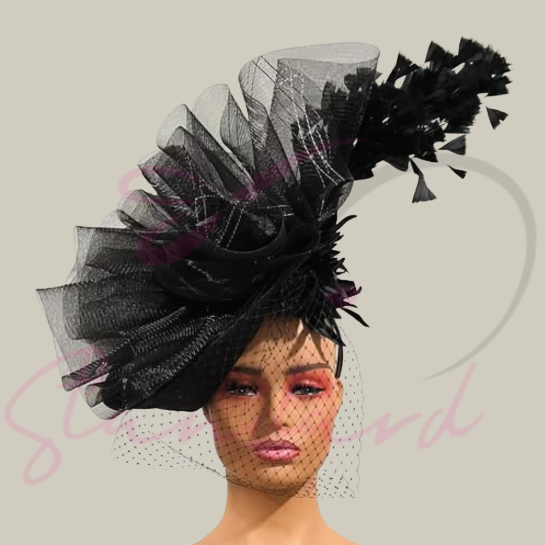 Black fascinator with crinoline, feathers, and a flower!