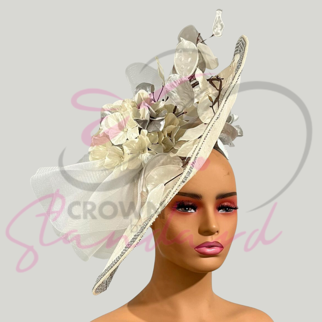 This fascinator is simply gorgeous. It has some bling that really sets it apart from the rest!