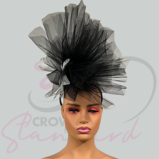 Beautiful black and silver fascinator accented with silver!
