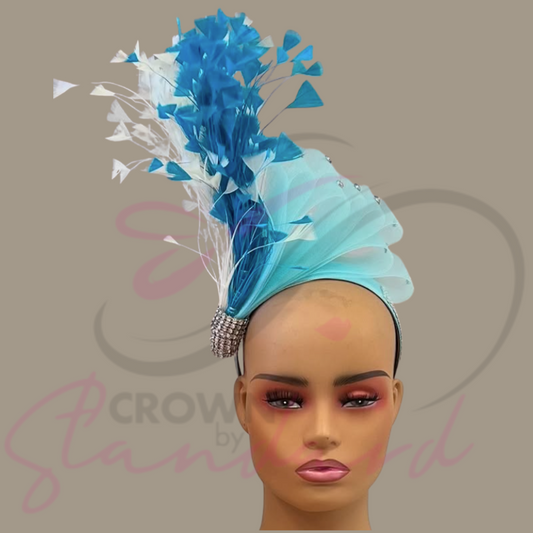 Light blue fascinator with crinoline and feathers on a headband!