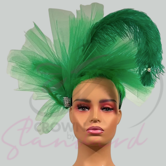Vibrant green fascinator with netting and feathers!