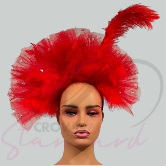 Red fascinator with netting, feathers, and rhinestones!