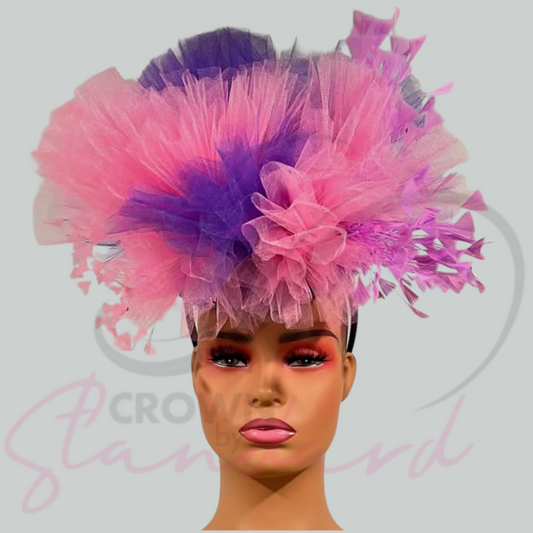 This fascinator has two beautiful colors of pink and purple.