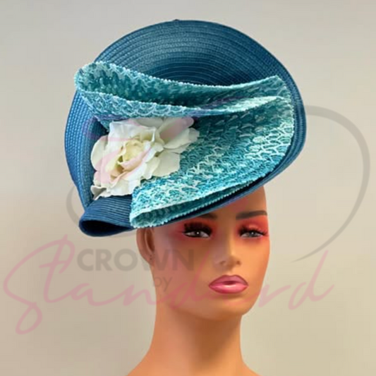 Light blue mixed with white fascinator with a flower!