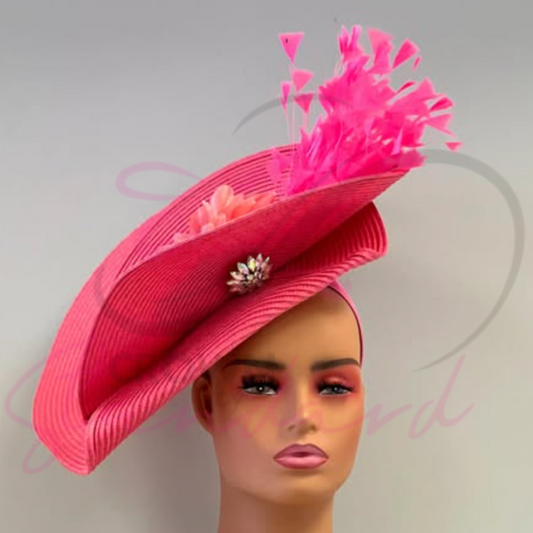 Pink fascinator with feathers and a rhinestone!