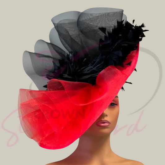 Red and black fascinator with crinoline, feathers, and a flower!