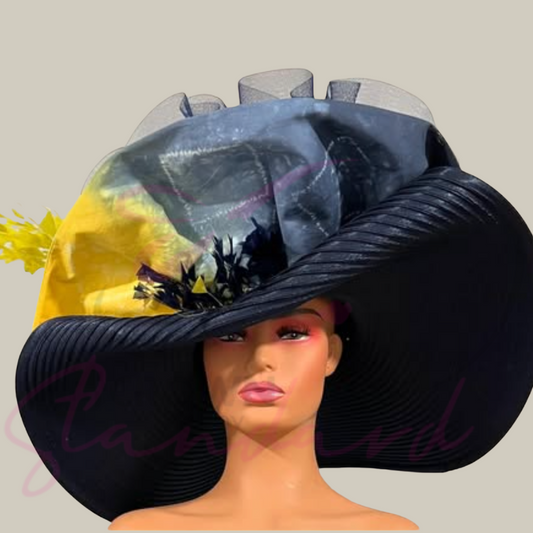 Navy blue hat with dyed textile, feather flower, crinoline, and feathers!