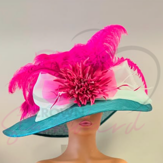 Blueish green hat with a huge bow, feather, and flower!