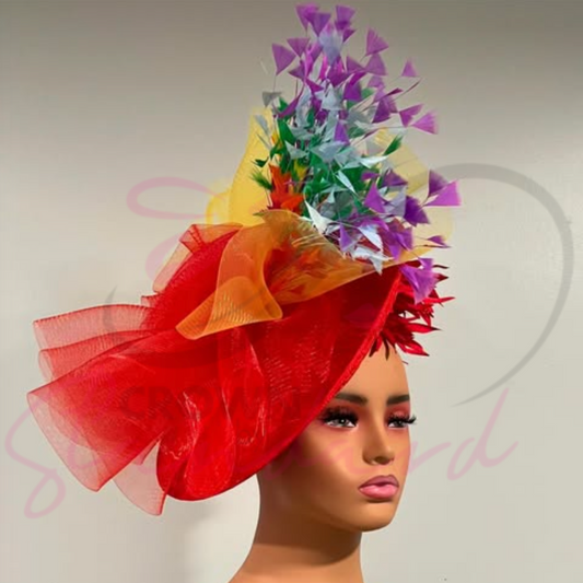 Red fascinator with multicolored feathers, feathers, and crinoline!