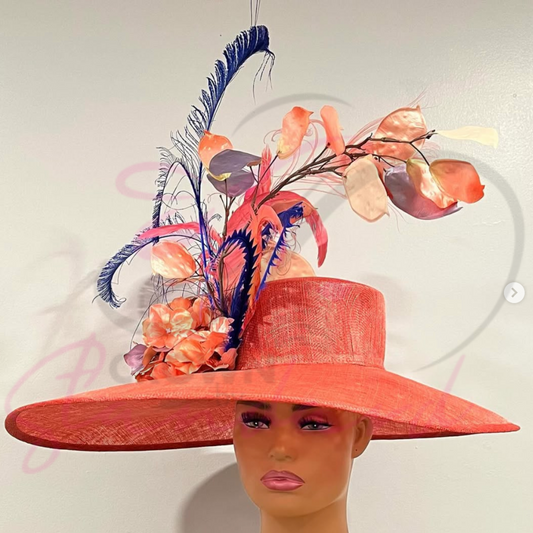 Glamorous peachy- orange hat with feathers and a huge flower!